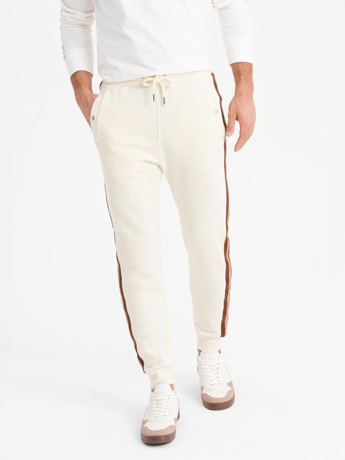 Men's sweatpants with piping and ribbing on the legs - cream V3 OM-PASK-0258