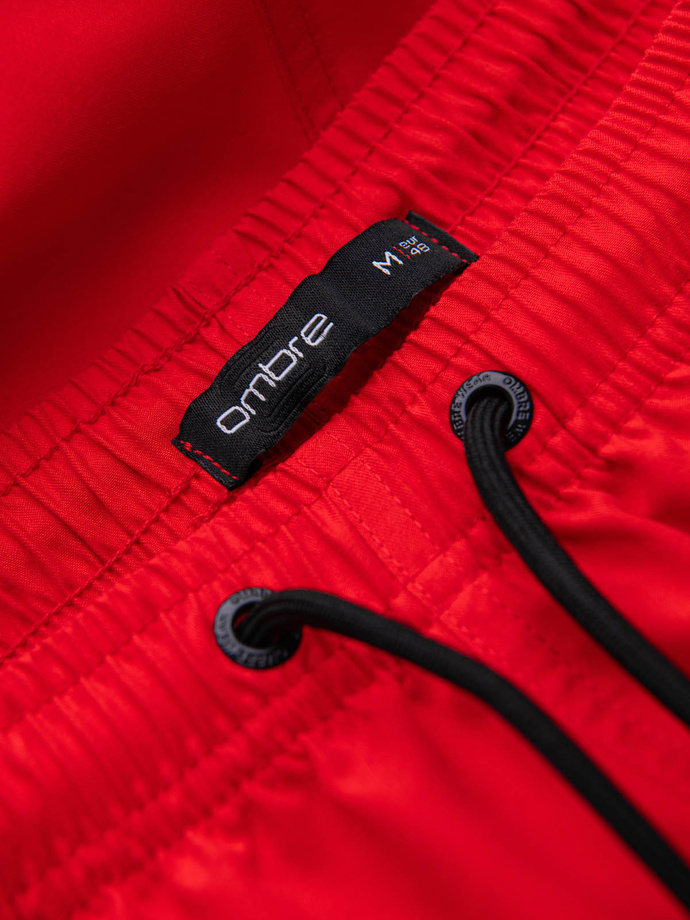 Neonowe szorty męskie kąpielowe z efektem magic print – czerwone V5 OM-SRBS-0147