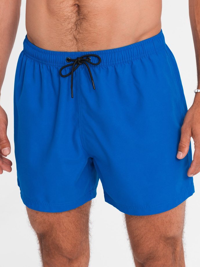 Neon men's swim shorts with magic print effect - blue V3 OM-SRBS-0147