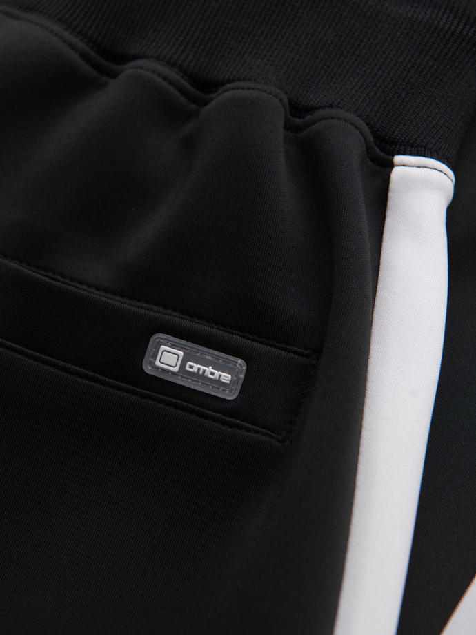 Dresowe męskie spodnie joggery z kontrastowymi lampasami – czarne V1 OM-PASK-0229